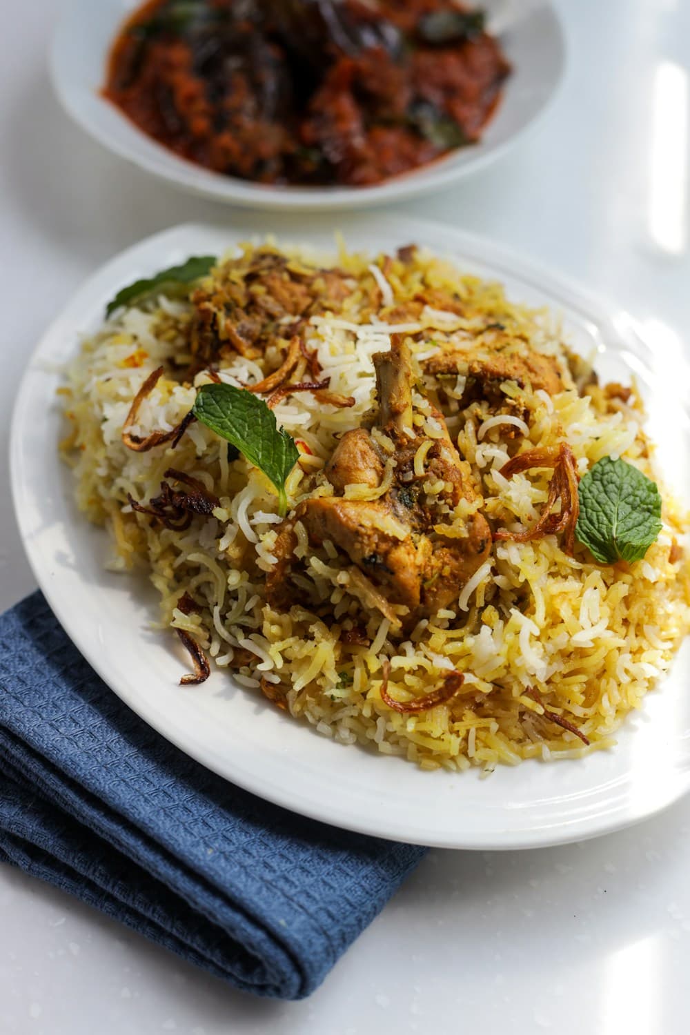 Chicken biryani with mint and crispy onions